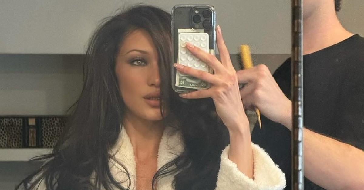 All-White Vibes: Bella Hadid Poses Braless in Wet T-Shirt for Sultry River Snap